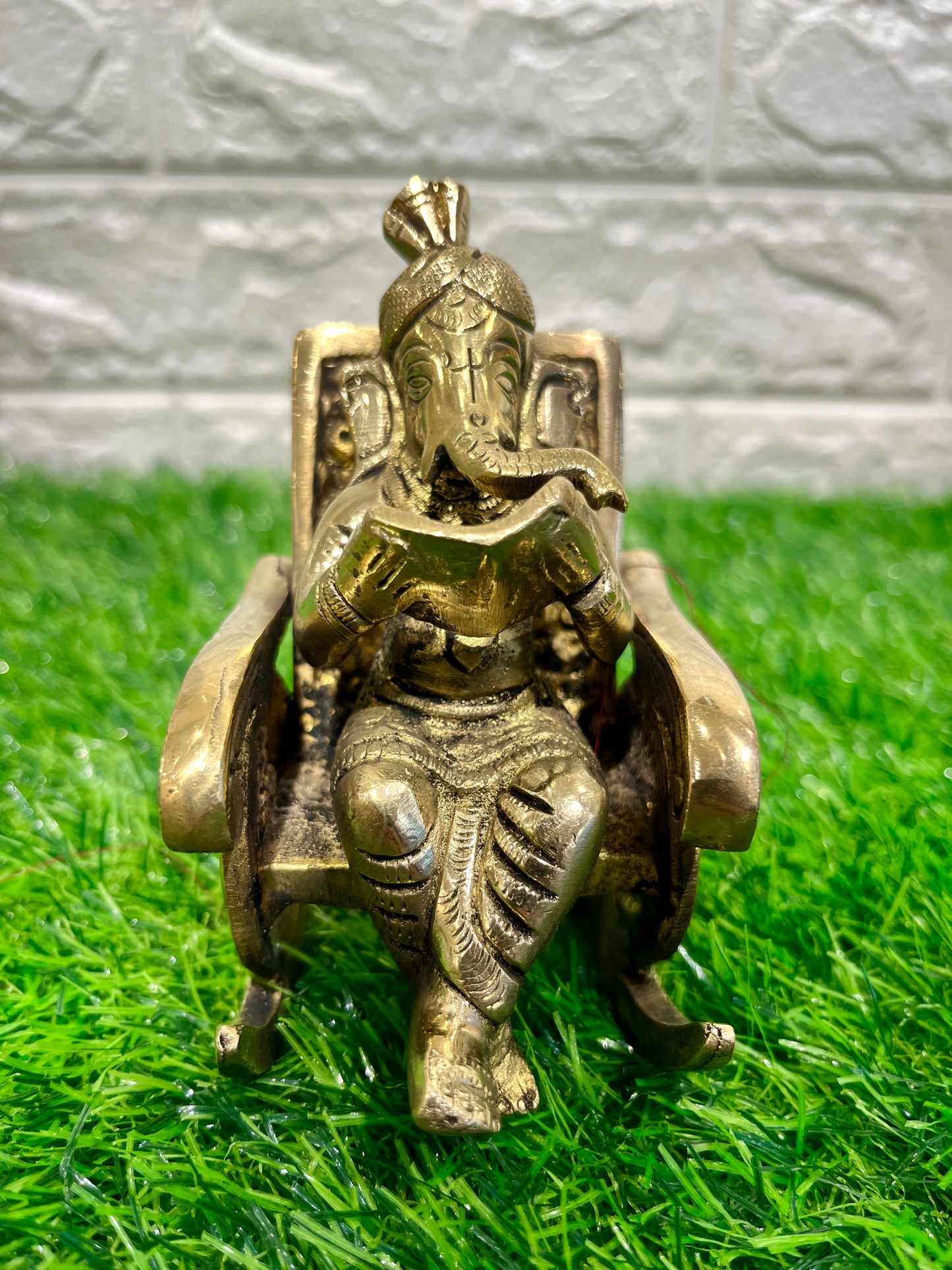 Brass Ganesh on Rocking Chair
