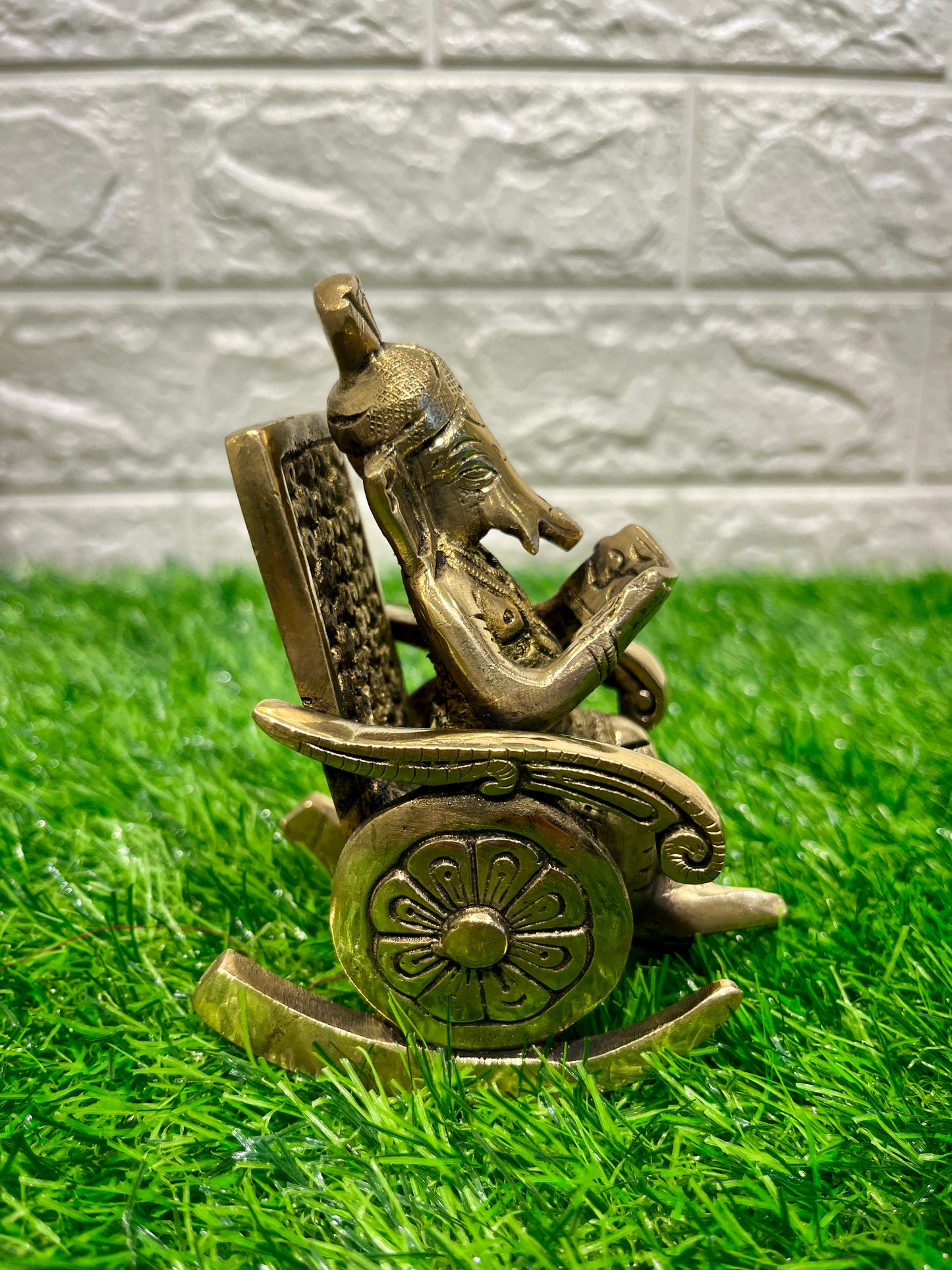 Brass Ganesh on Rocking Chair
