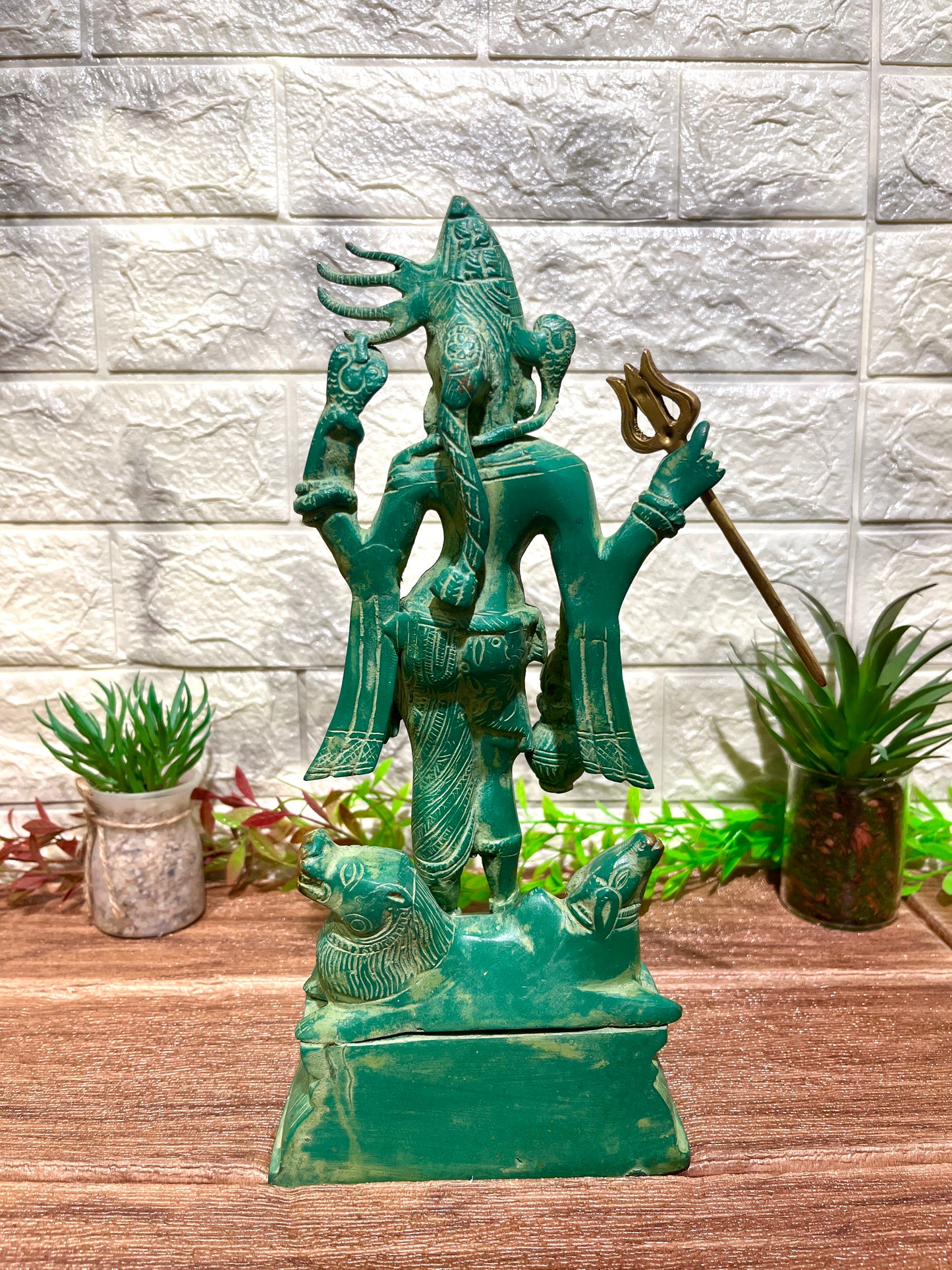 Ardhanarishvara holding Trishul