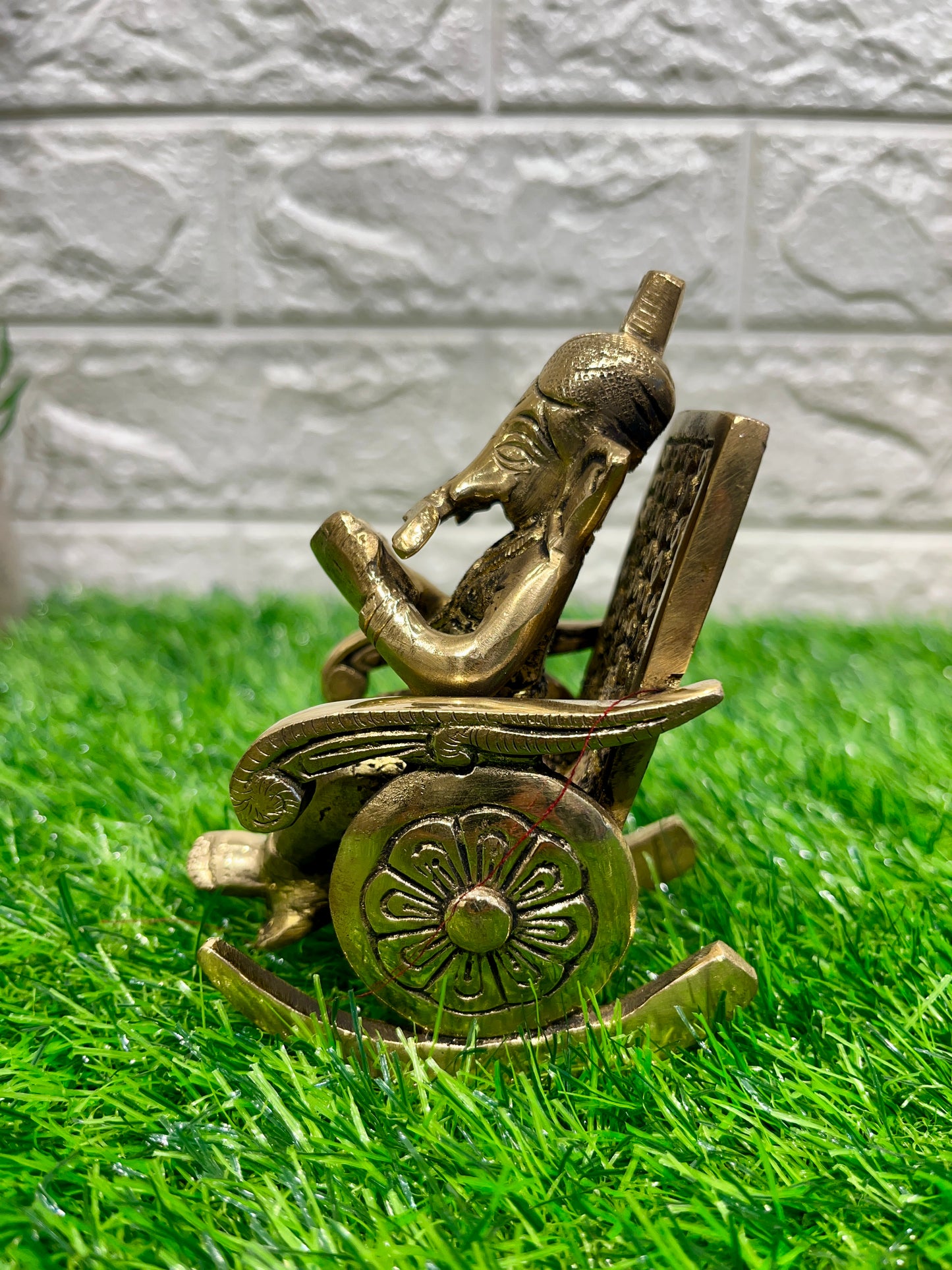 Brass Ganesh on Rocking Chair